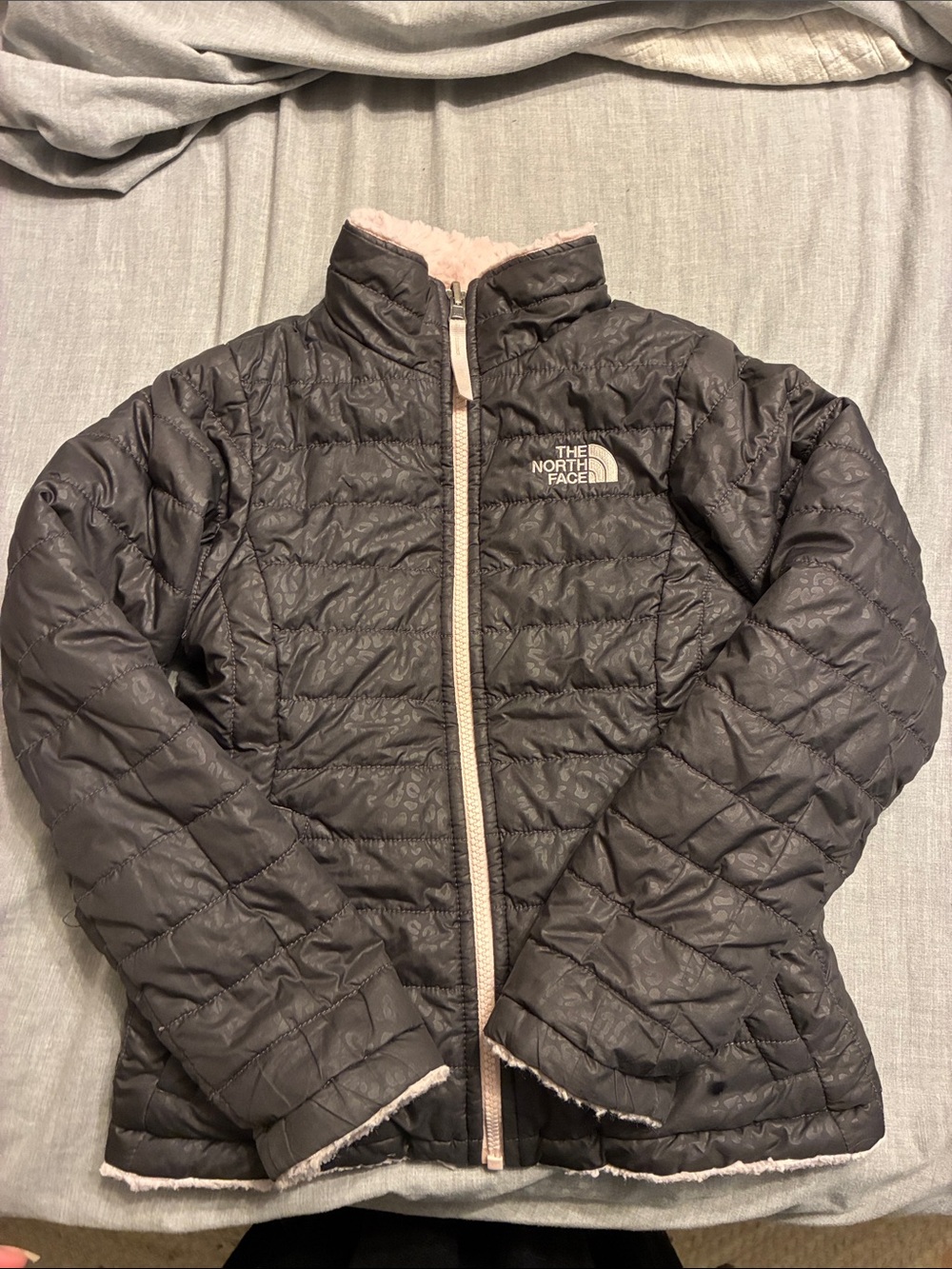 The North Face Girls' Black Quilted reversible Jacket with Pink Trim